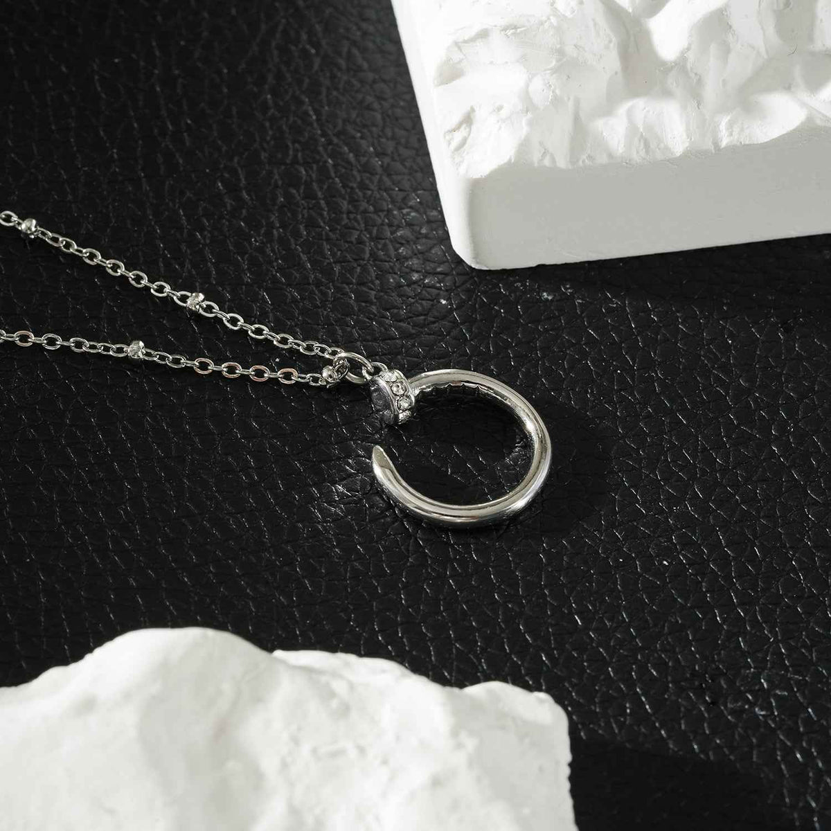 CSENGE Silver (White Gold) Necklace:  Zirconia Embedded Circular Nail Pendant on a Satellite Beaded Chain