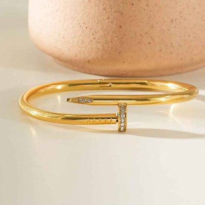 DAVIDKA Gold: Zirconia Embedded Industrial-Chic Twisted Nail Bracelet