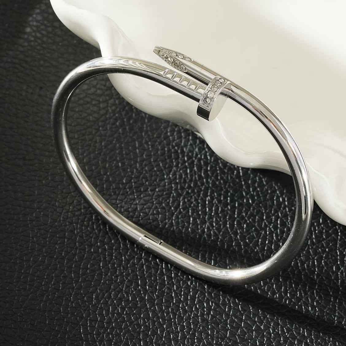 DAVIDKA Silver (White Gold): Zirconia Embedded Industrial-Chic Twisted Nail Bracelet