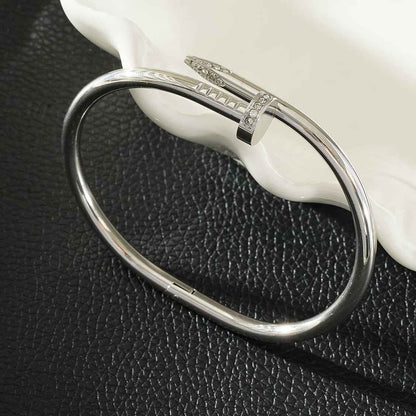 DAVIDKA Silver (White Gold): Zirconia Embedded Industrial-Chic Twisted Nail Bracelet
