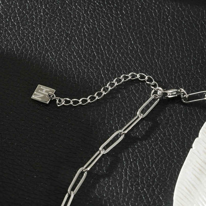 HEART WHITE Silver (White Gold): Paper Clip Chain Anchoring an Enameled White Heart Charm