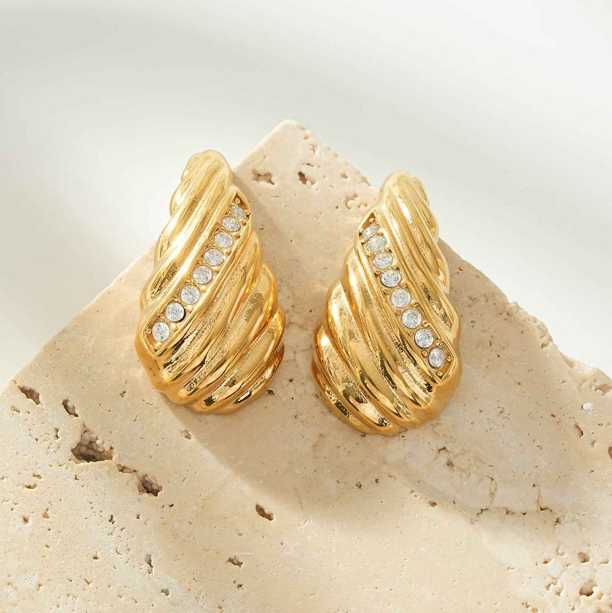 CAASHA Gold: Teardrop Statement Stud Earrings with Textured Lines & Pavé Zirconia Center