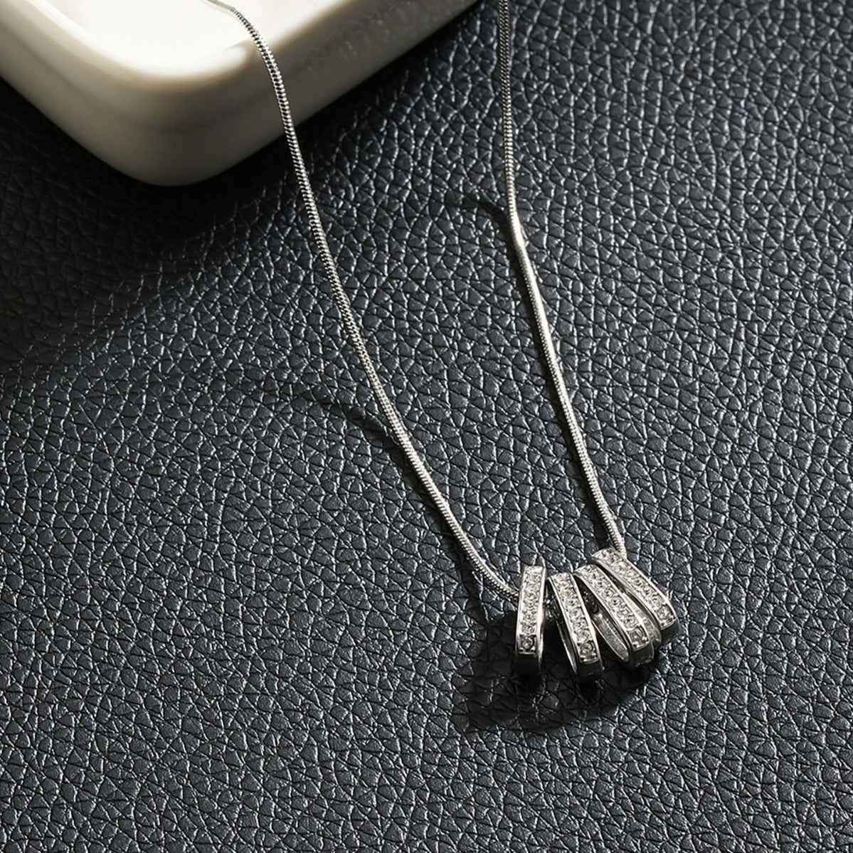 GARNA Silver (White Gold): Mini Snake-Skin Chain with Zirconia-Adorned Oval Shaped Charms