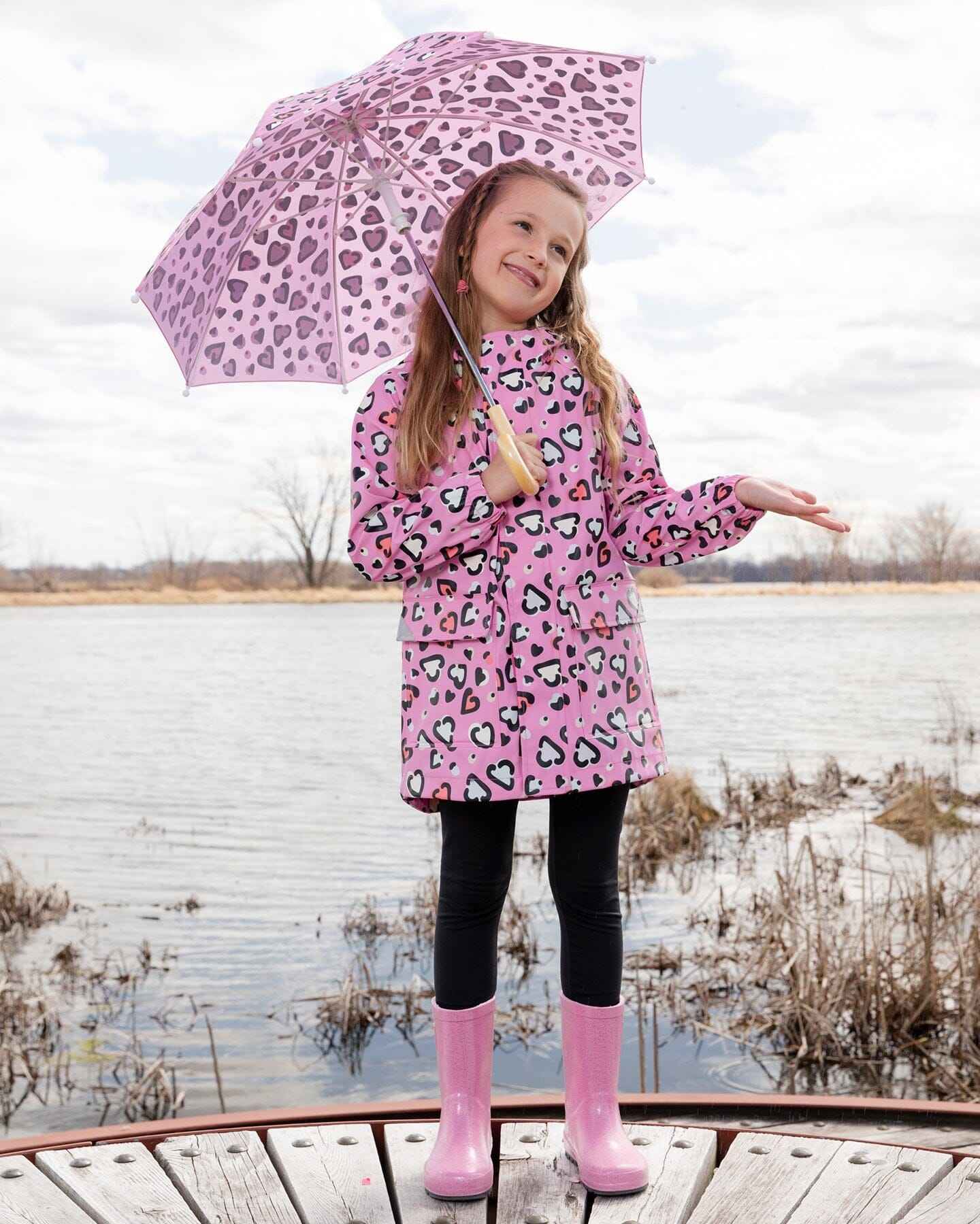 Pink raincoat with color-changing hearts