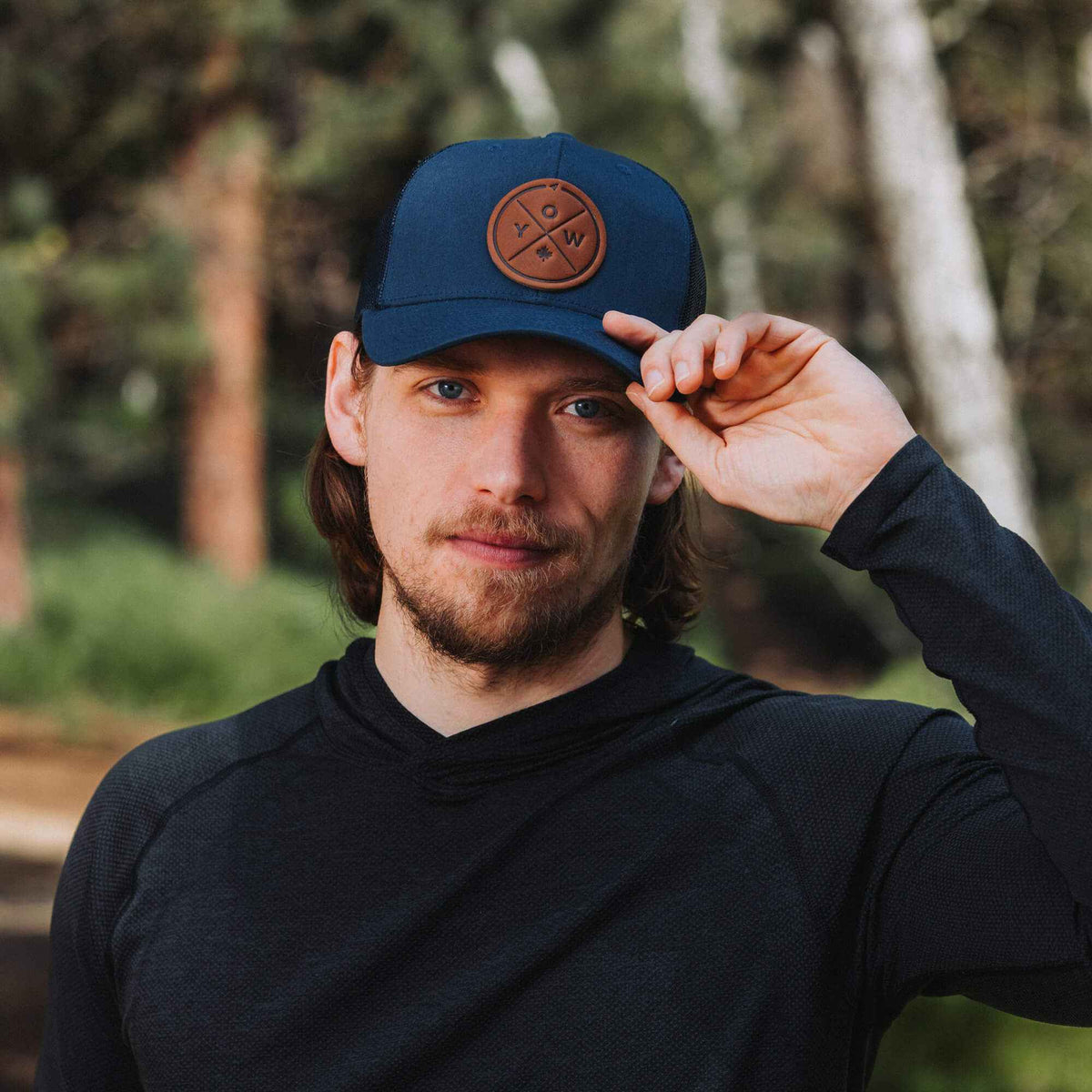 YOW Compass Leather Patch Trucker Hat