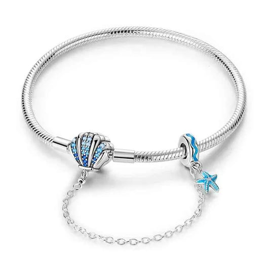 Sterling Silver Seashell Charm Bracelet with Blue CZ Gradient